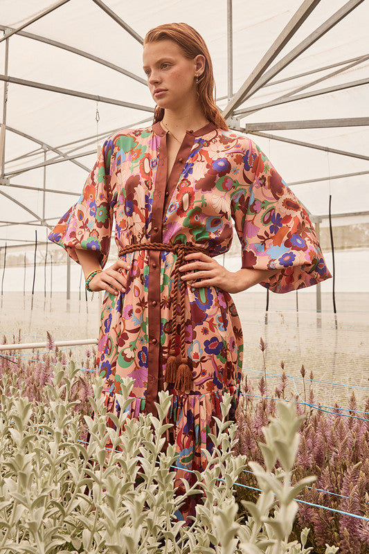 bohemian traders dress Dedication to Detail: This show-stopping midi dress is made from cotton madras that's woven in India using traditional techniques. It's patterned with checks in tonal shades of blue and pink and cut