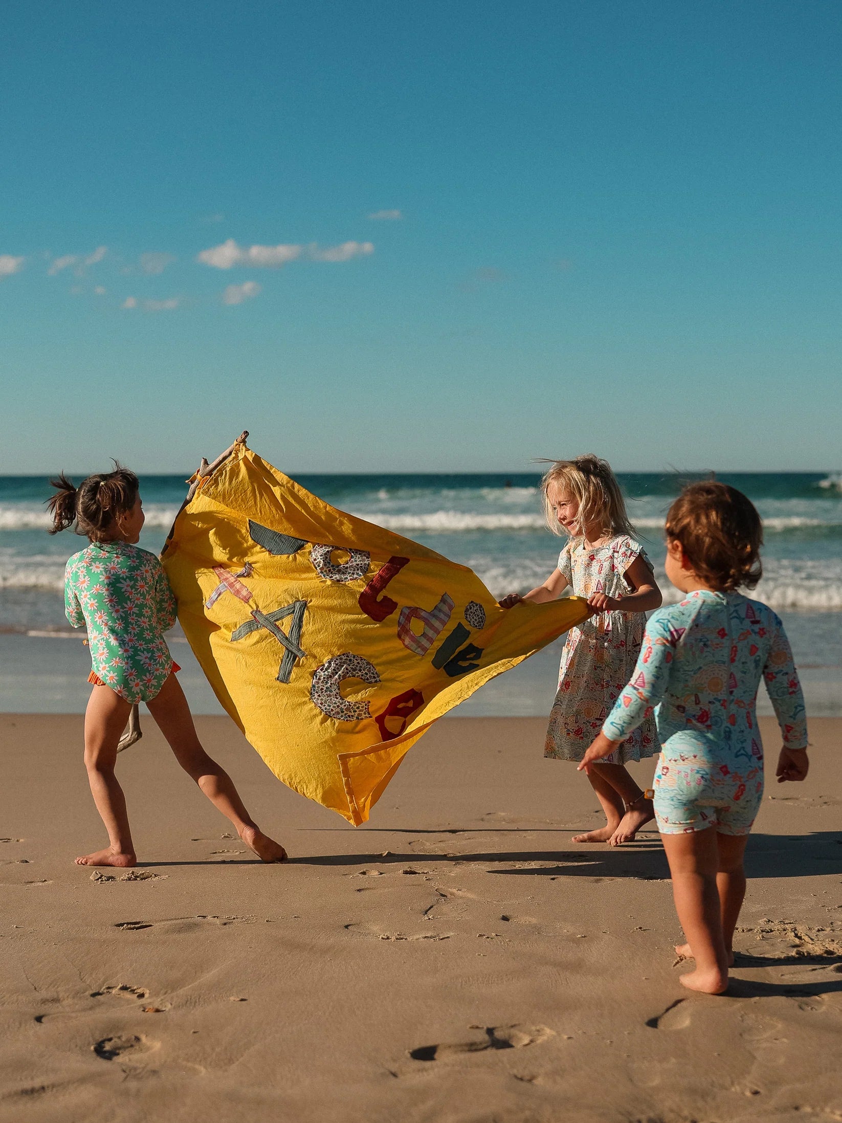 Goldie + Ace  Daisy Patch Long Sleeve Frill Swimsuit