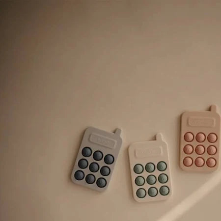 Mushie Phone Press Toy