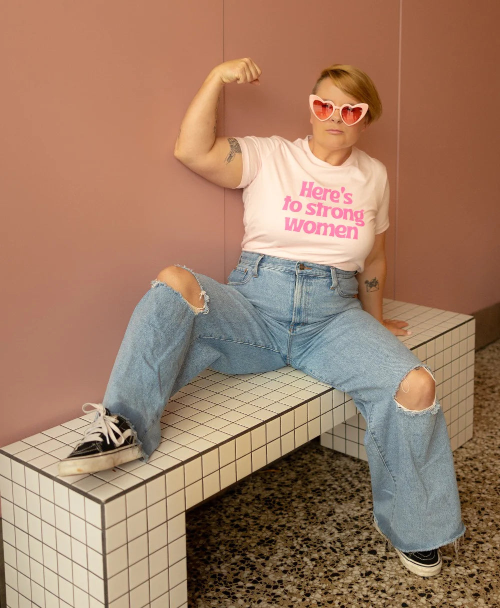 CONFETTI REBELS HERE'S TO STRONG WOMEN PINK TEE